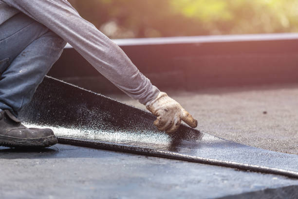 Professional Exterior Waterproofing technician working in Grant, MI